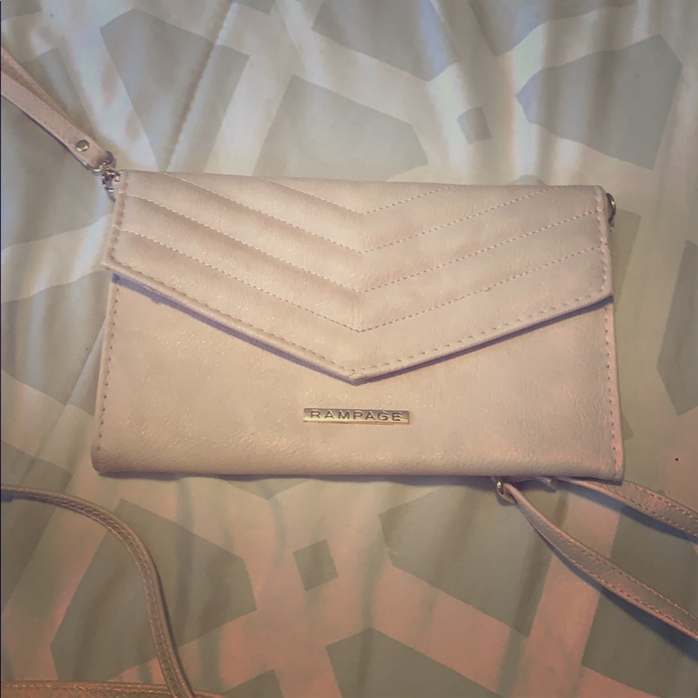 Selling this light pink Rampage bag